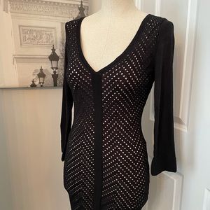 Black Bebe mini dress with nude slip. V neck Small